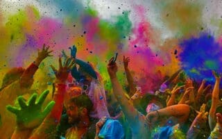 happy-people-drenched-in-bright-colors-celebrating